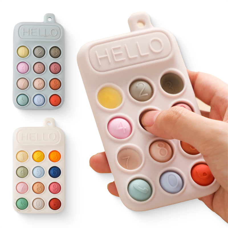 Baby Products Clicks - Baby Silikon Handy-Beißring Spielzeug mit Druckknöpfen